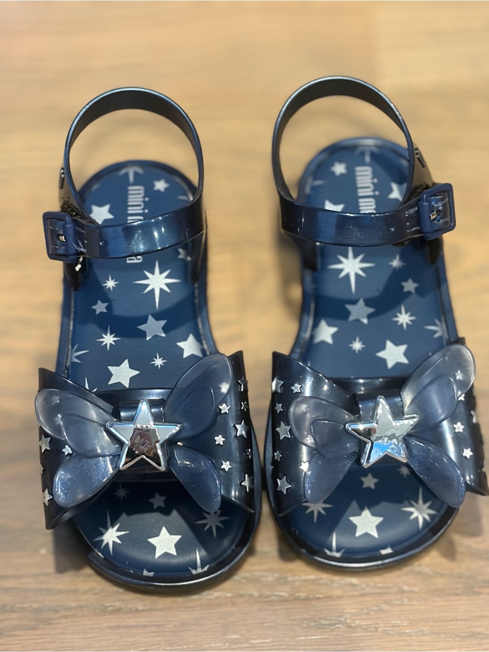 Mini Melissa Navy Star Jelly Sandals with Bow and Silver Star Accent. Never worn